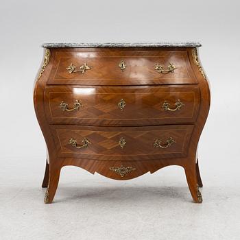 A Rococo style chest of drawers, first half of the 20th Century.