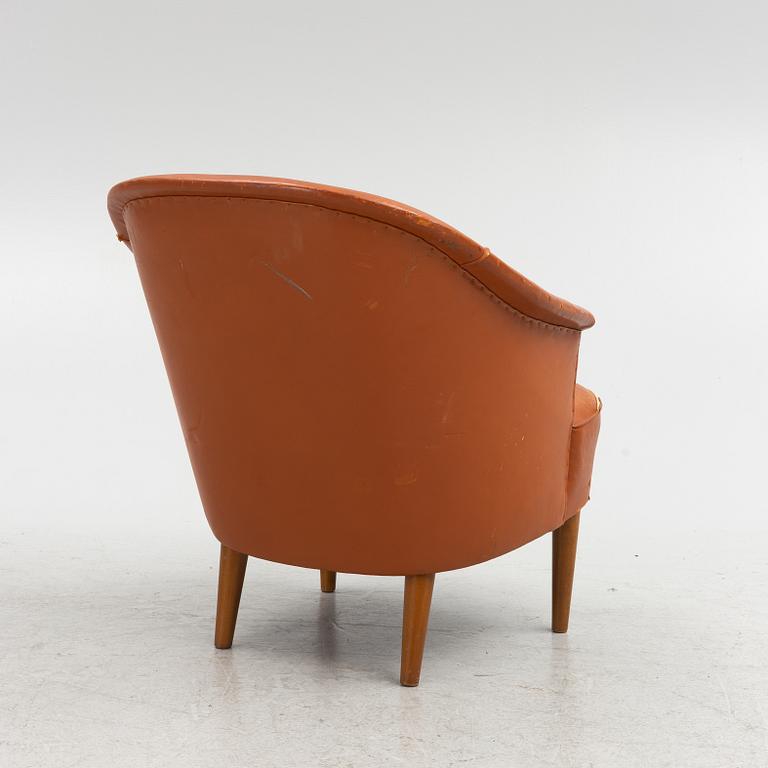 Carl Malmsten, A leather upholstered armchair, model "Lillasyster", O.H. Sjögren, second half of the 20th century.