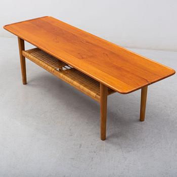 HANS J WEGNER, a teak and oak coffee table from Andreas Tuck, Denmark.