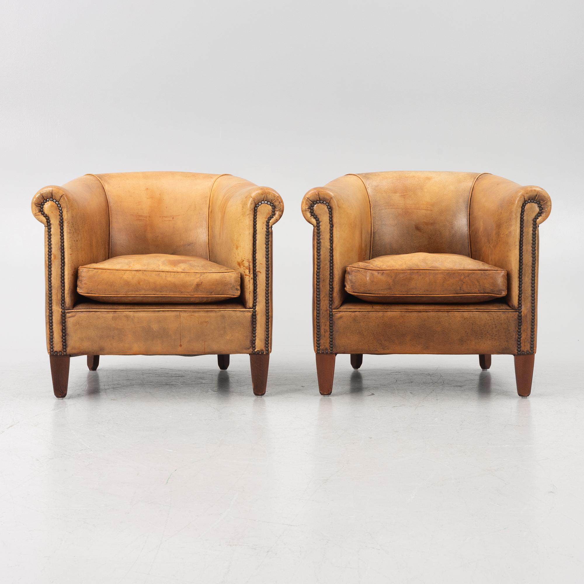 Club chairs, a pair, Bendic International, late 20th century.