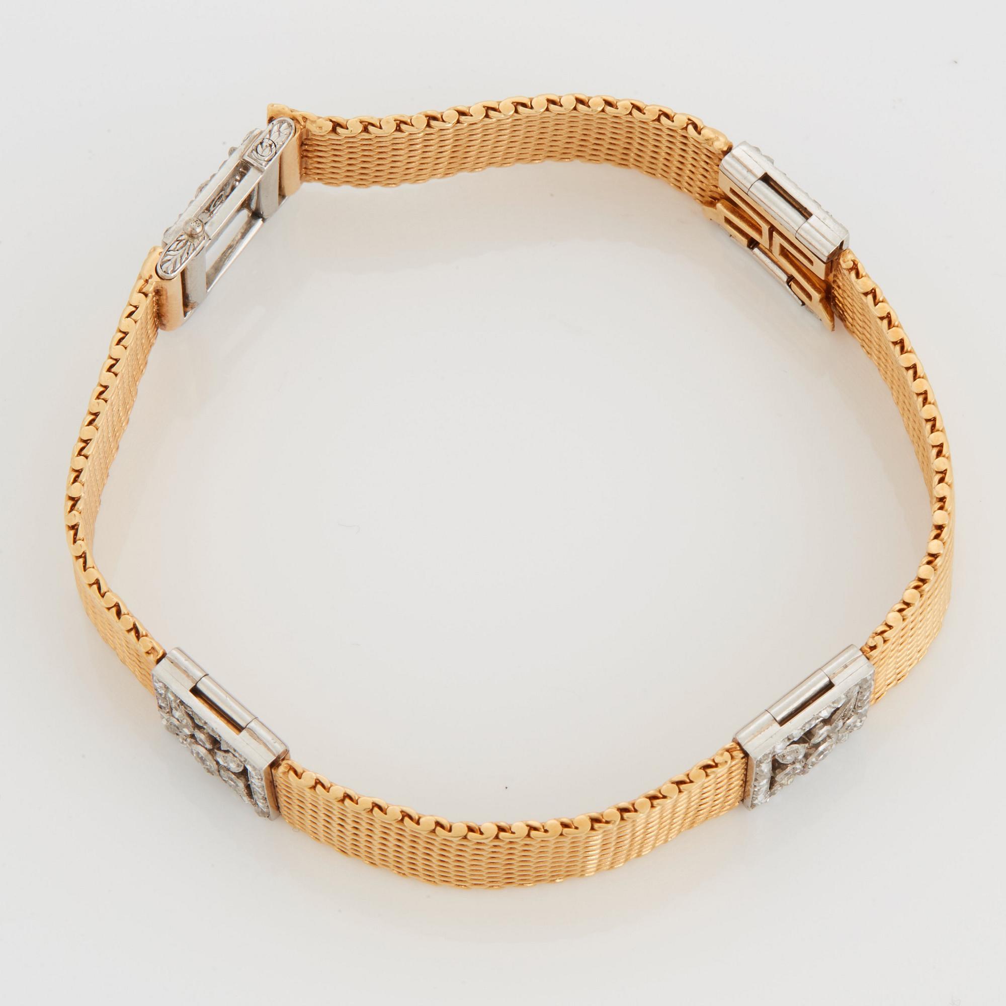 Armband 18K guld med motiv i platina med gammal- och rosenslipade diamanter.