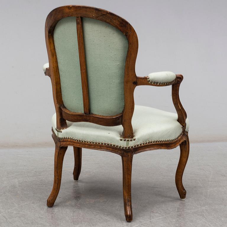 A French 18th century Louis XV armchair.