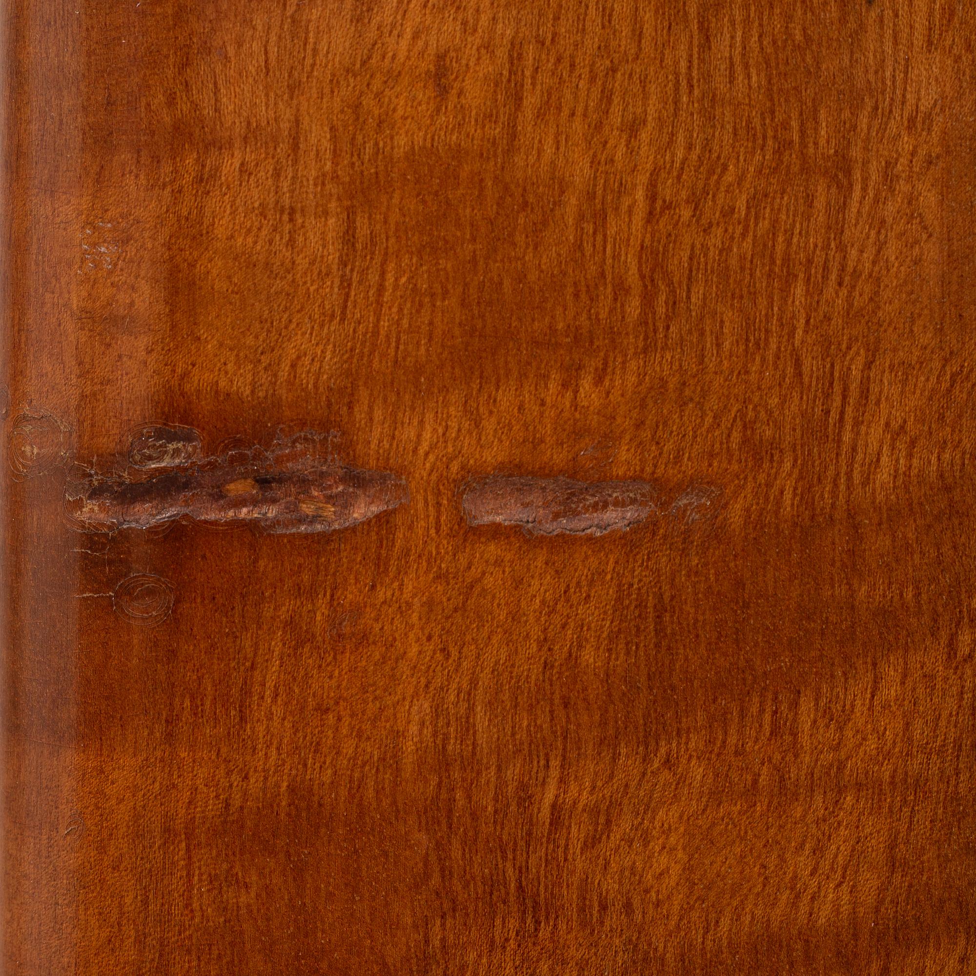 A 1940's Swedish Modern mahogany cabinet from Möbelbolaget.