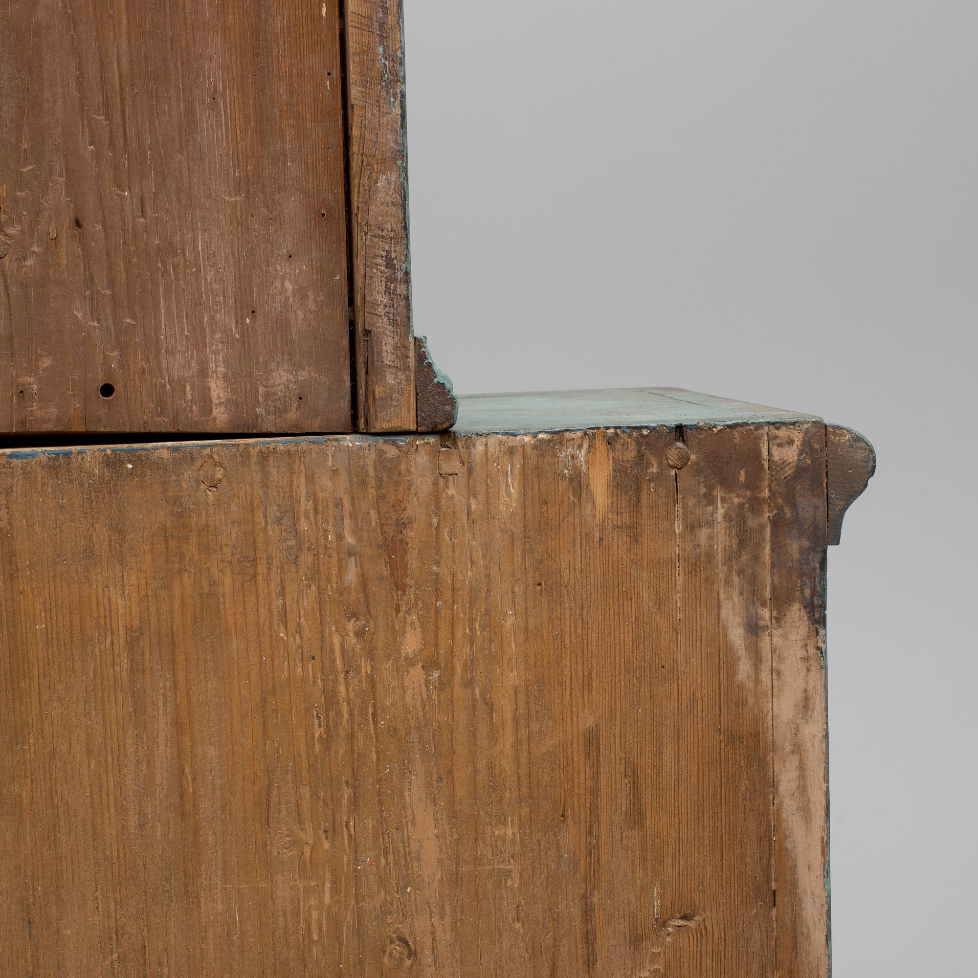 A 18th century corner cabinet.