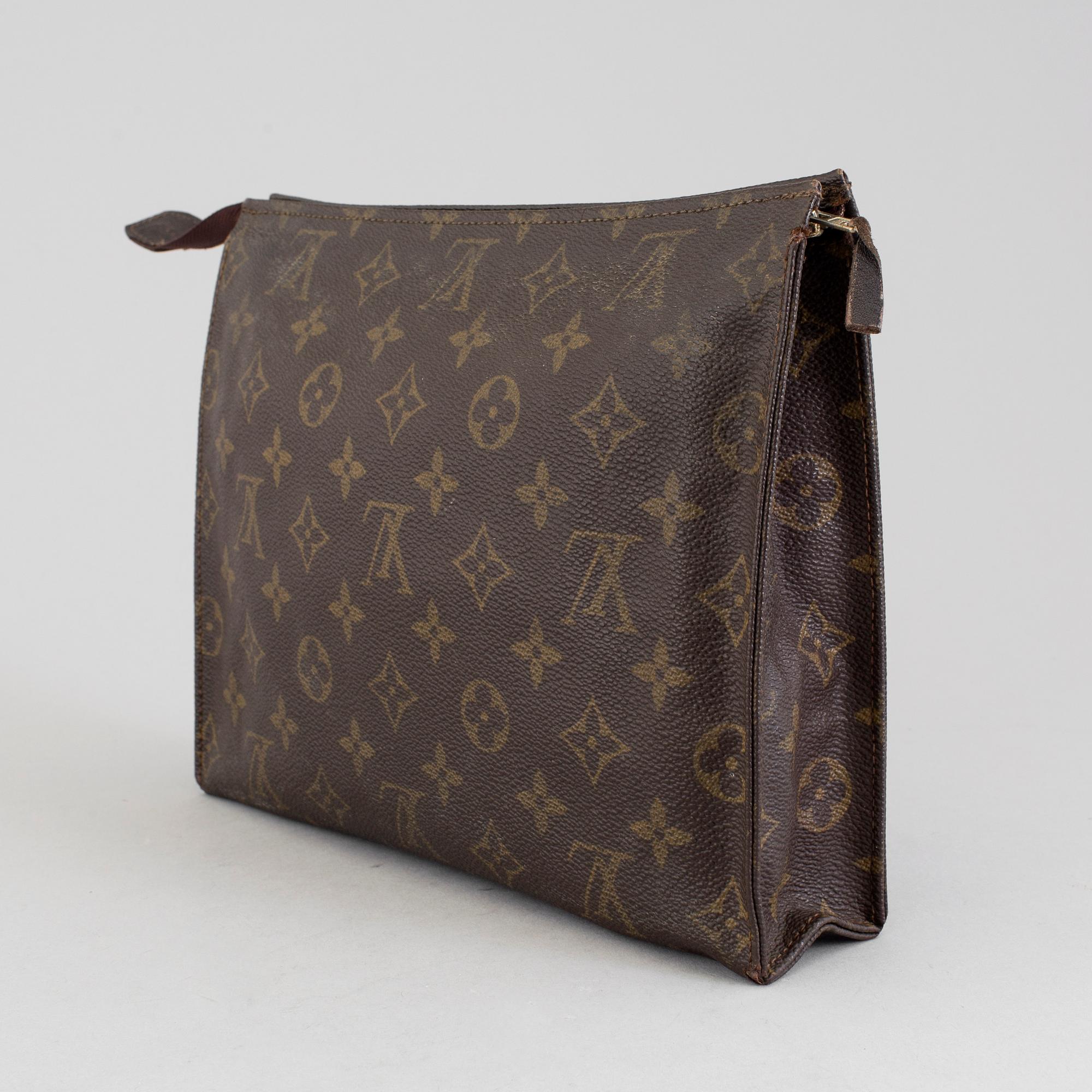 LOUIS VUITTON, a monogram canvas make up bag.