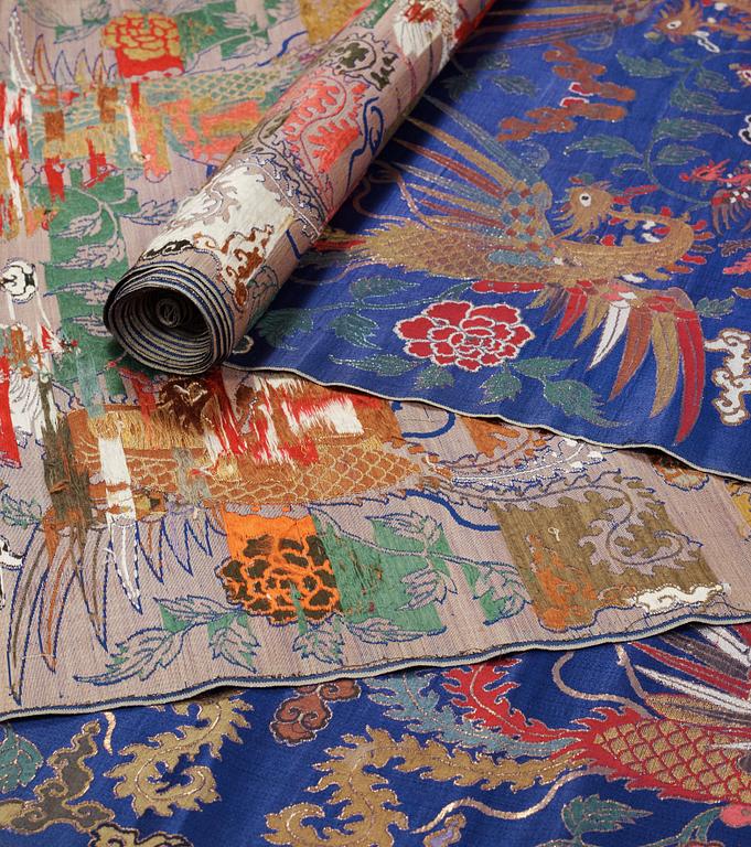 FABRIC ROLLS, 2 pieces, silk. Two uncut rolls of silk yardage. 777 x 71 and 702 x 72 cm. China late Qing dynasty.