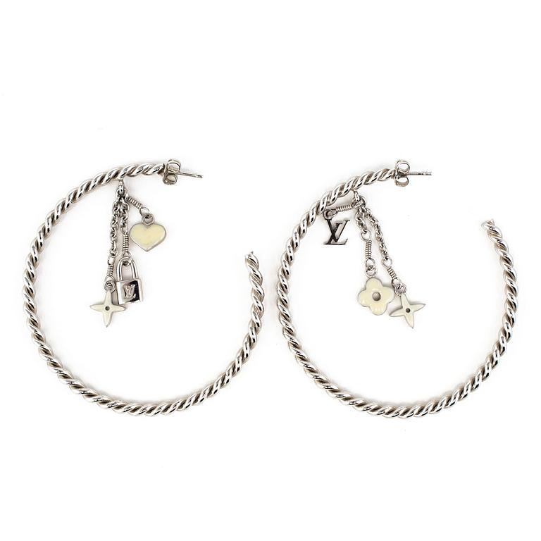 LOUIS VUITTON, a pair of charm earrings.