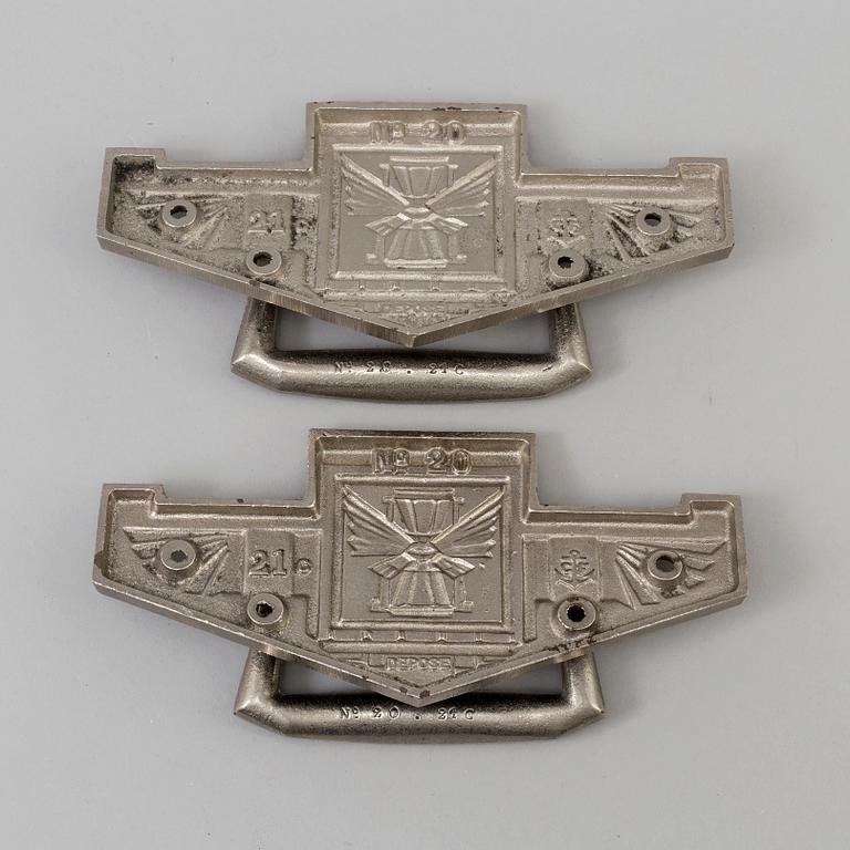 TWO METAL ART DÉCO DOOR KNOCKERS, 1930s.