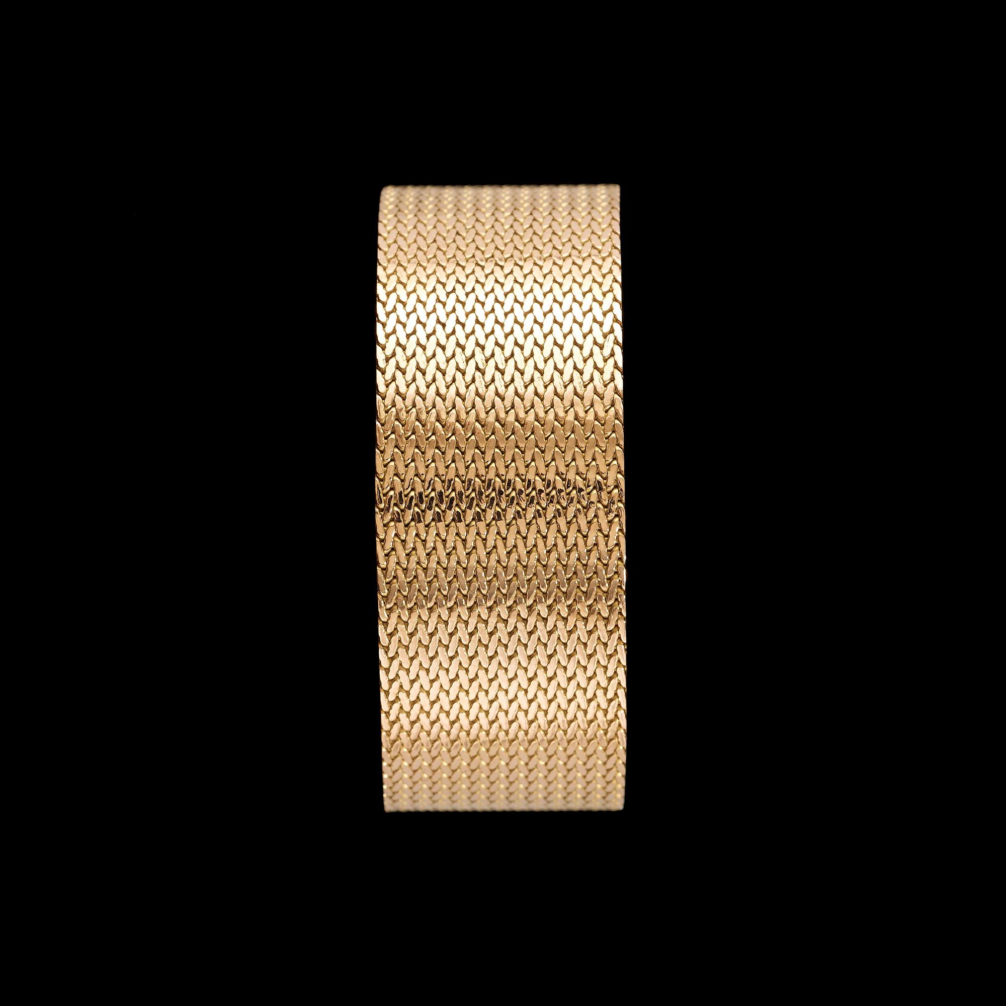 A gold bracelet.