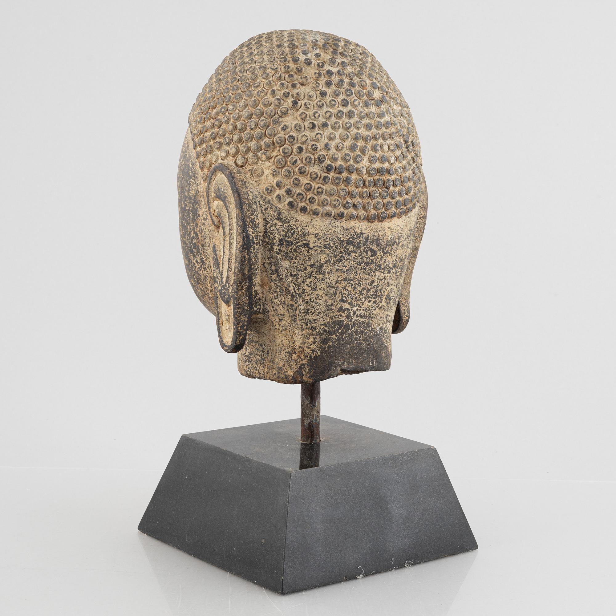 A Buddha's head, stone. Ming style.