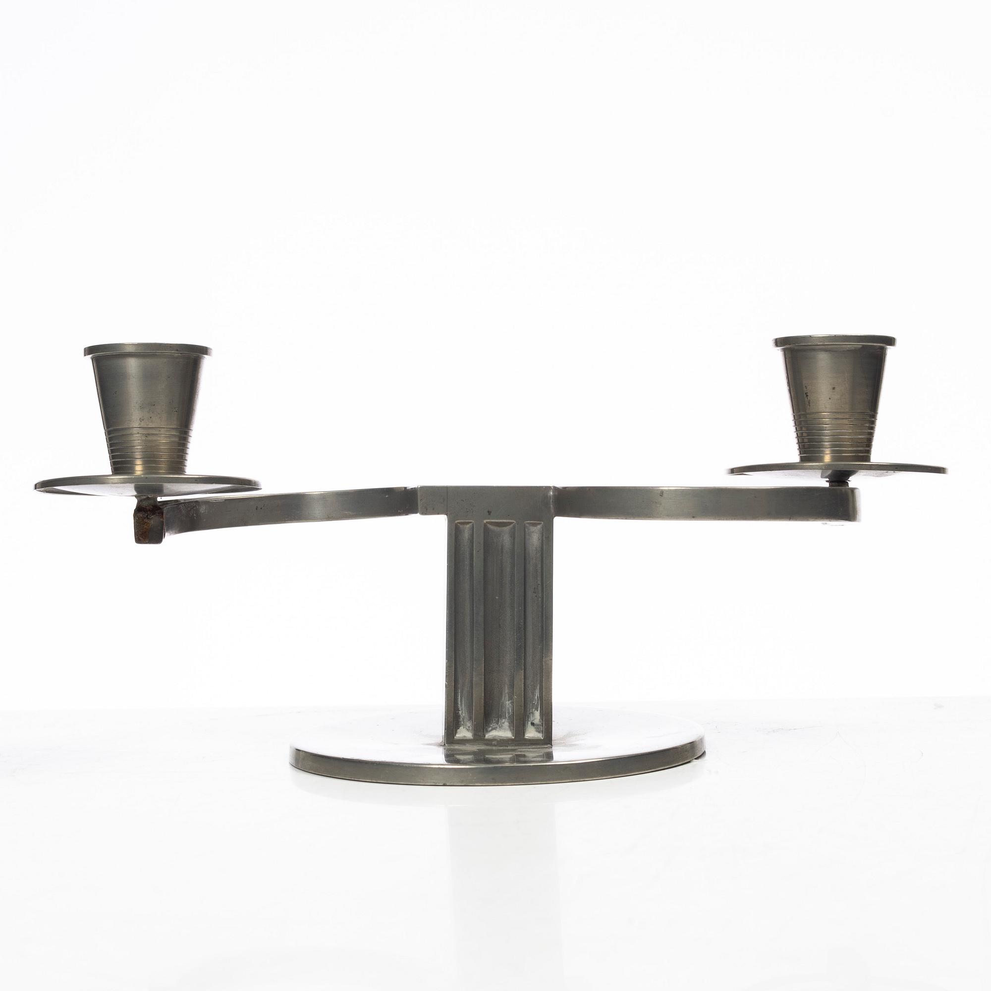 Nils Fougstedt, A pair of candelabra, FAK (Fabriksaktiebolaget Kronsilver), Stockholm, 1934.