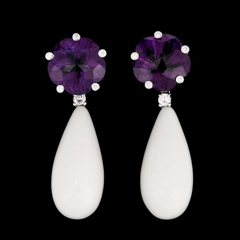A pair of amethyst, tot. 17.76 cts, white ceramics and brilliant cut diamond earrings, tot. 0.28 cts.