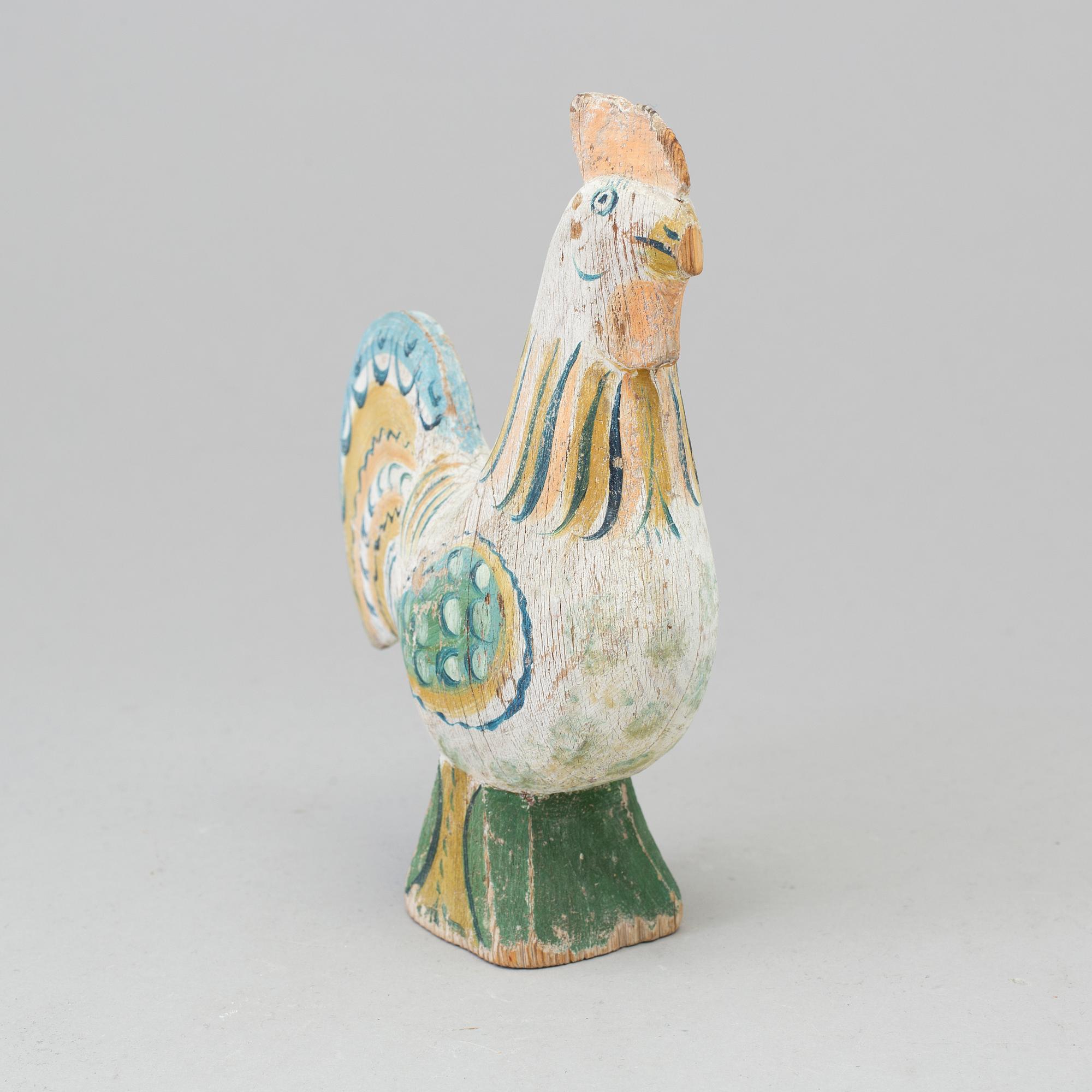 A painted wooden cockerel, 19th/20th century.