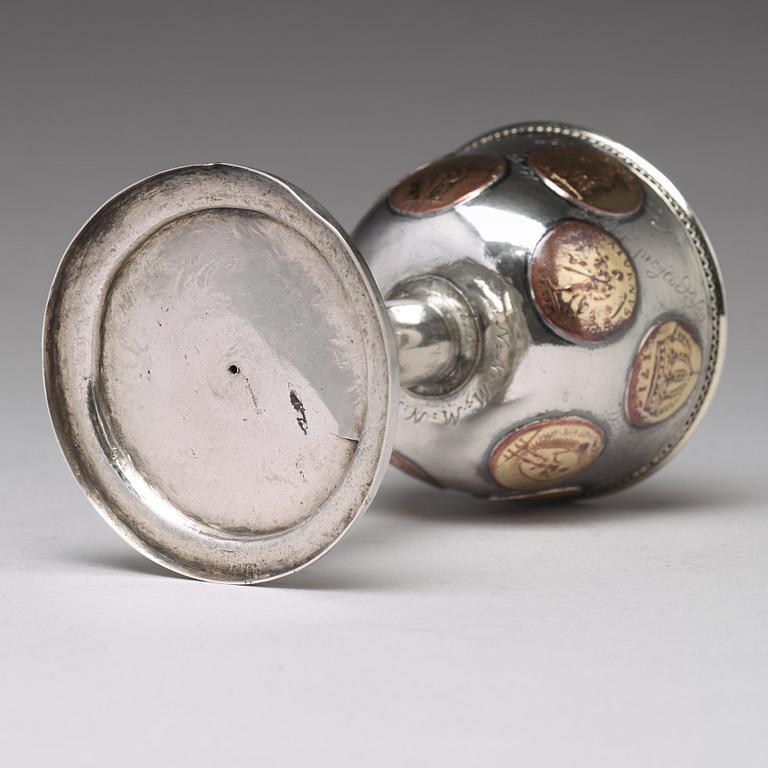 A Swedish 18th century parcel-gilt silver tumbler / cup, with copper coins, unmarked.