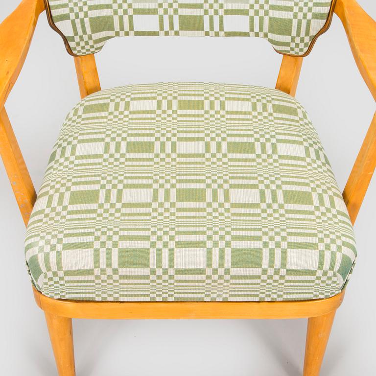 A mid-20th century armchair upholstered with fabric by Johanna Gullichsen.