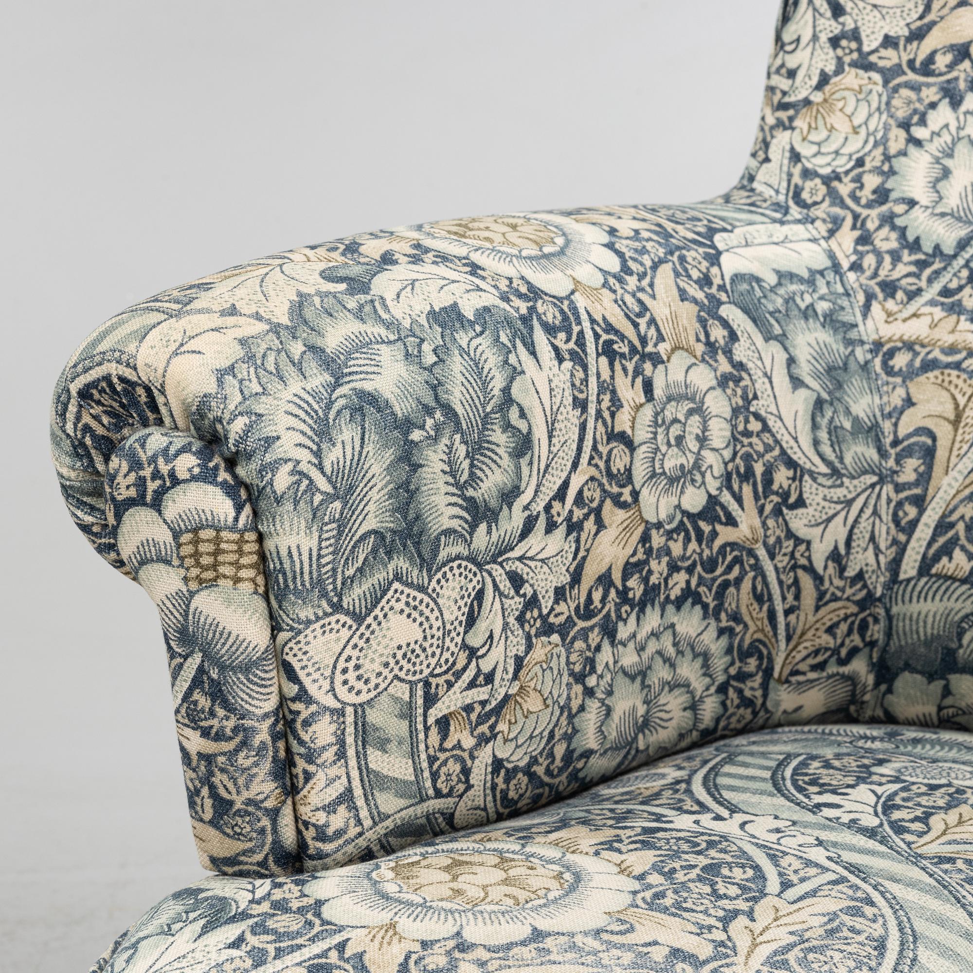 Carl Malmsten, a pair of Hemmakväll easy chairs .