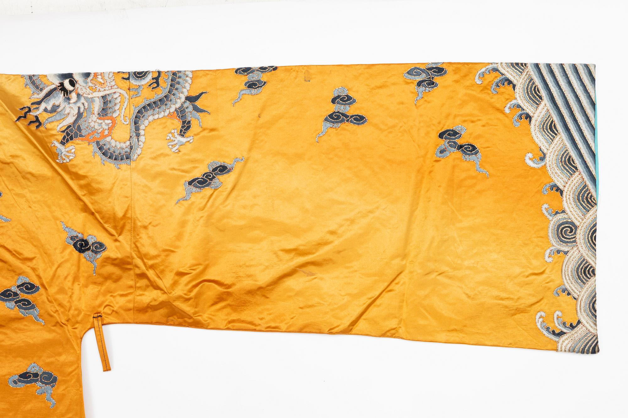 A Chinese embroidered silk robe, 20th century.