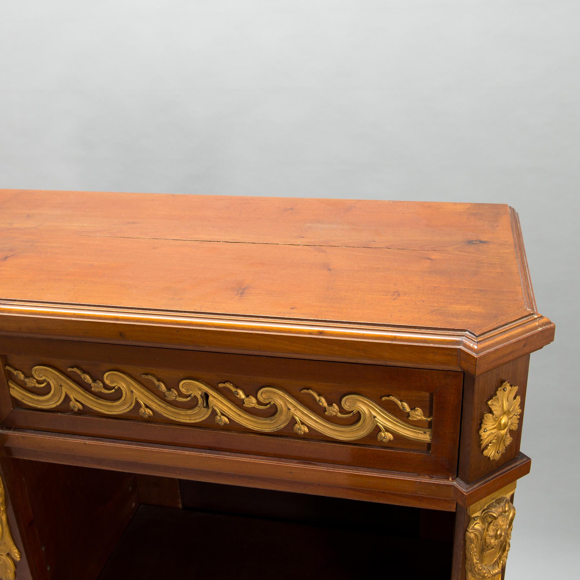 A 20th-century Louis XVI style bookcase.