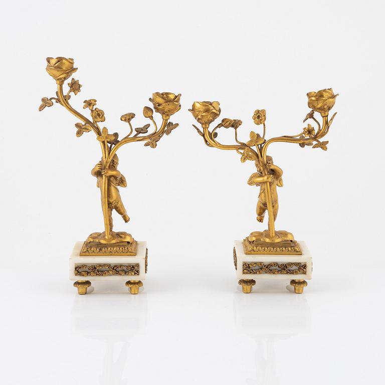 A pair of Louis XVI style candelabras, 20th century.