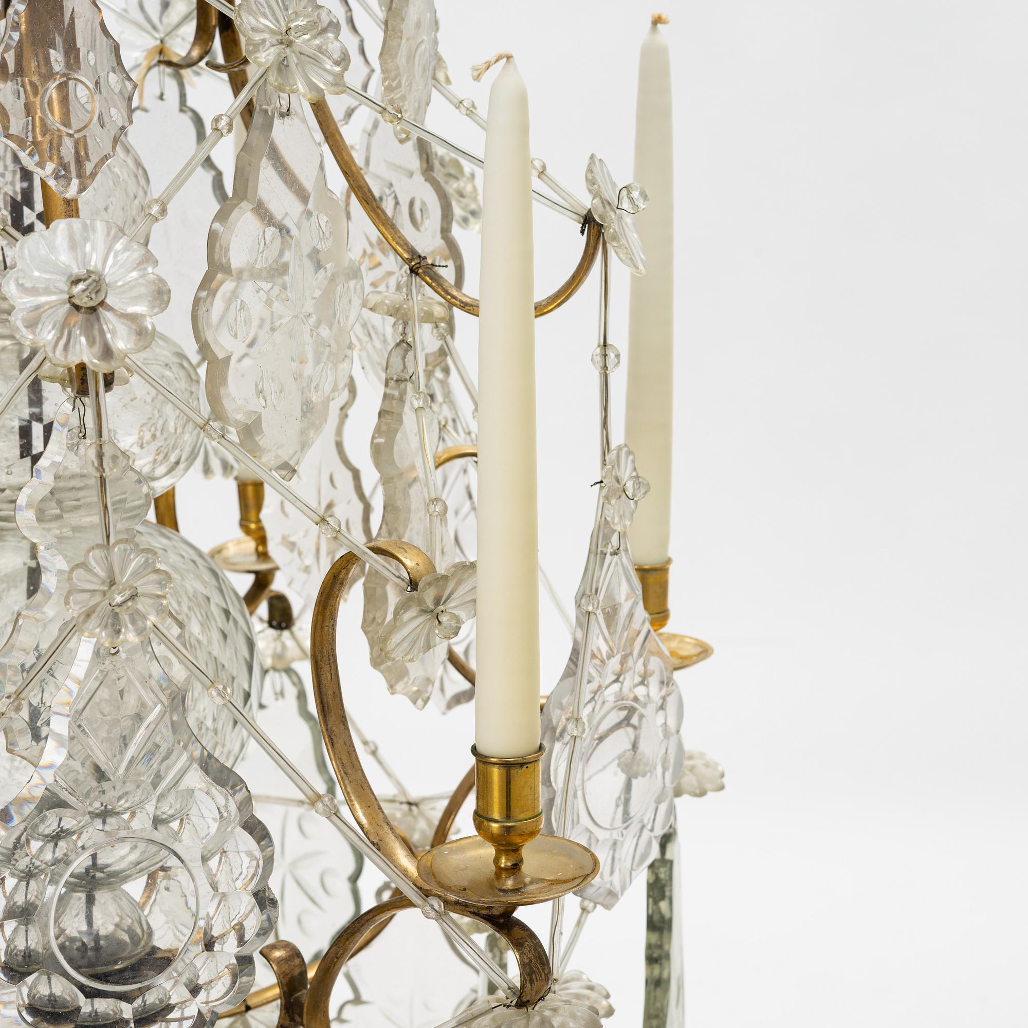 A rococo style chandelier, around 1900.