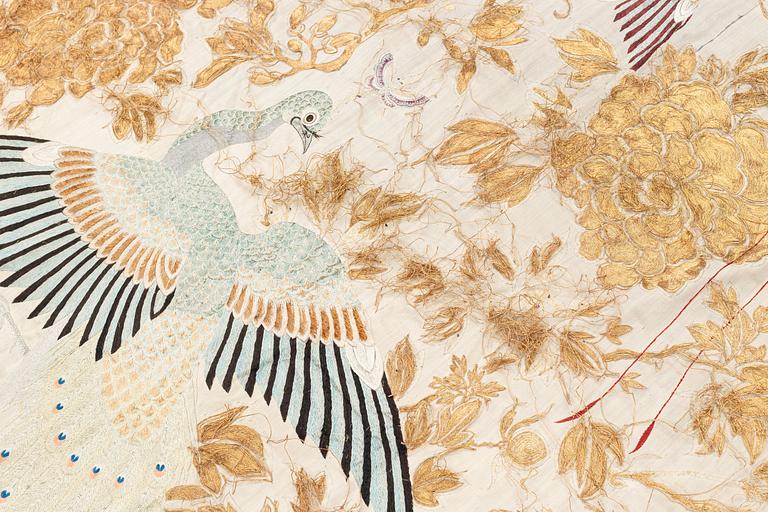 A Chinese silk embroidered wall panel/bedspread, Qing dynasty, 19th Century.