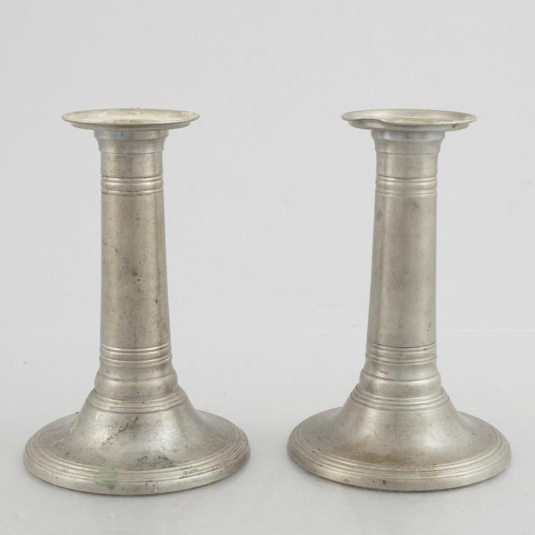 A pair of pewter candle sticks, model A702, Firma Svenskt Tenn, Sweden, 1928.