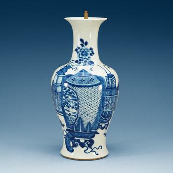 1877. A blue and white vase, Qing dynasty, 19th Century with a six character Qianlong hall mark.