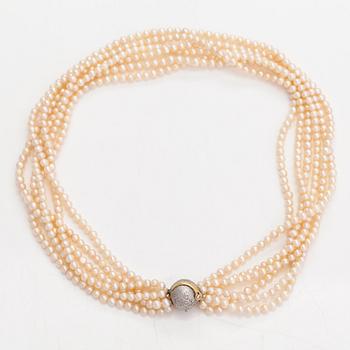 Ole Lynggaard, A 6-strand pearl collier, 14K gold, diamonds ca. 0.08 ct in total and cultured pearls. Denmark.