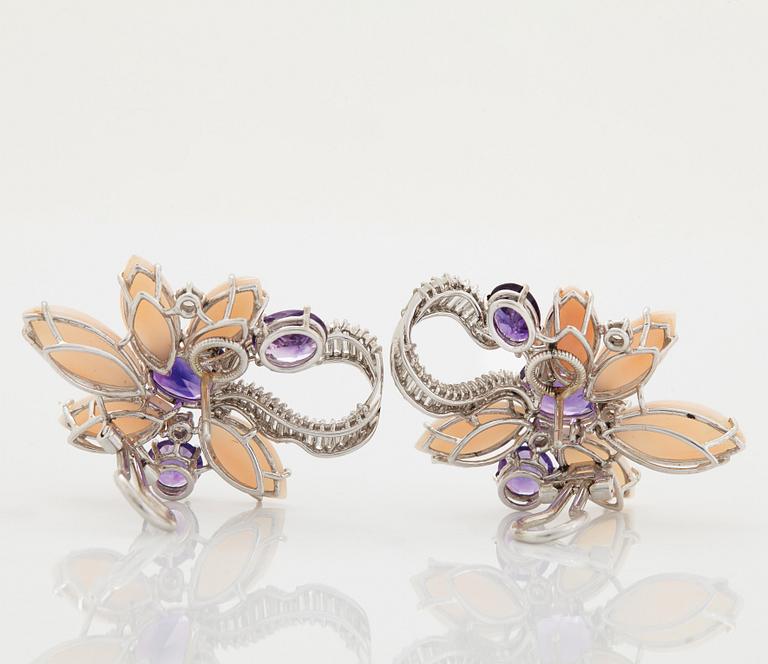 A pair of 18K white gold earrings set with faceted amethyst and coral.