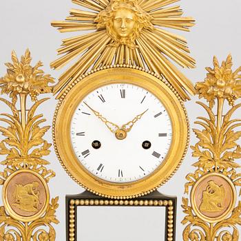 An Empire mantle clock, first half of the 19th Century.