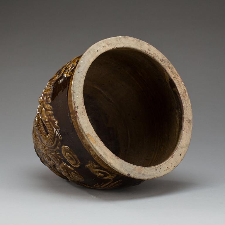 URNA, lergods, Kina, 1900-tal.