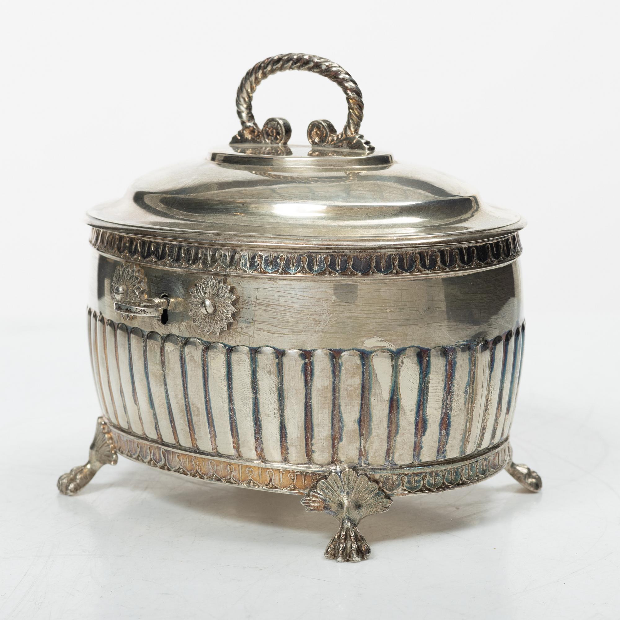 A Swedish silver coffee pot, cream jug and sugar box, Gustavian style, mark of AG Dufva, Stockholm 1911-1912.