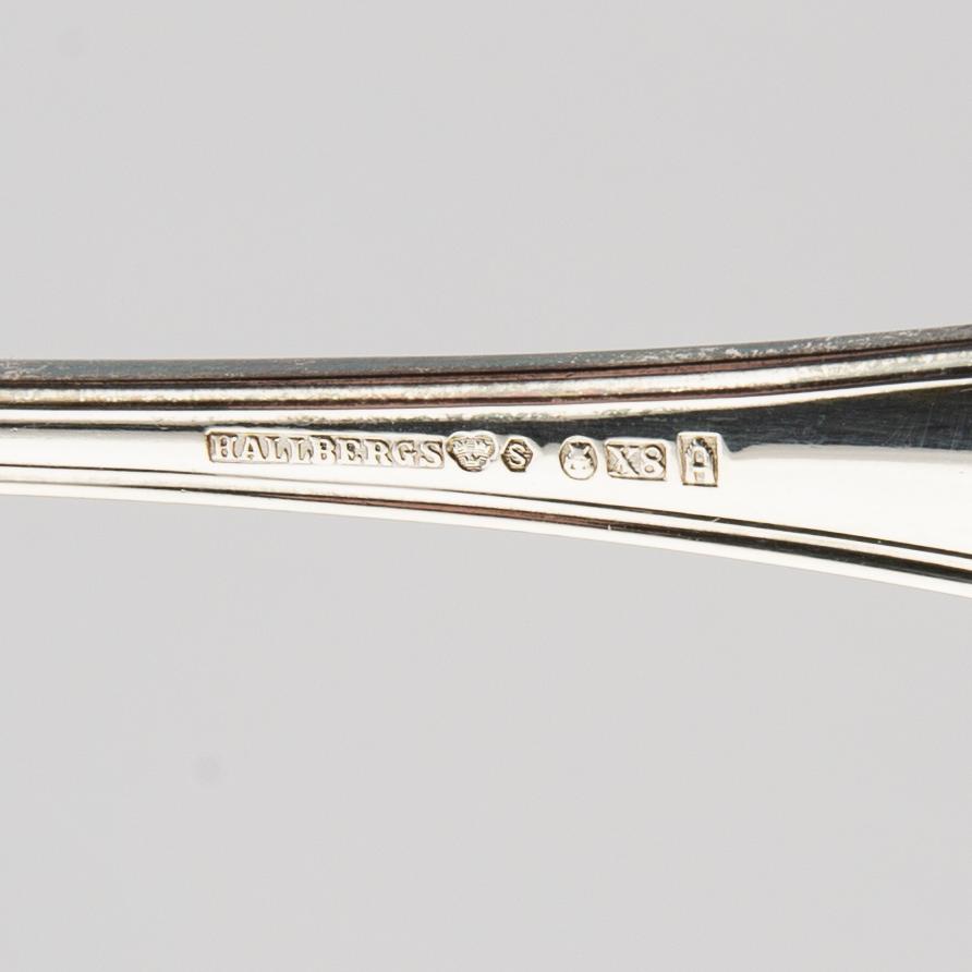 A Swedish 20th century set of 15 silver spoons mark of Hallbergs Stockholm 1948, weight 1352 grams.