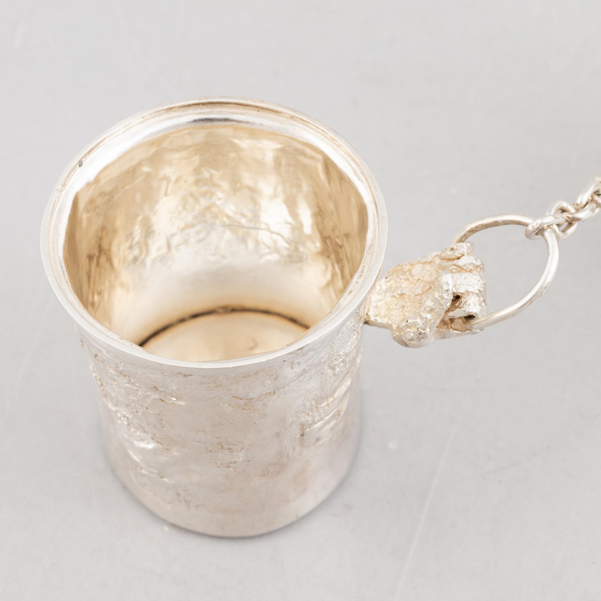 A sterling silver sculpture in two parts with a chain, mark of Lars Arby, Gothenburg, Sweden 1976.
