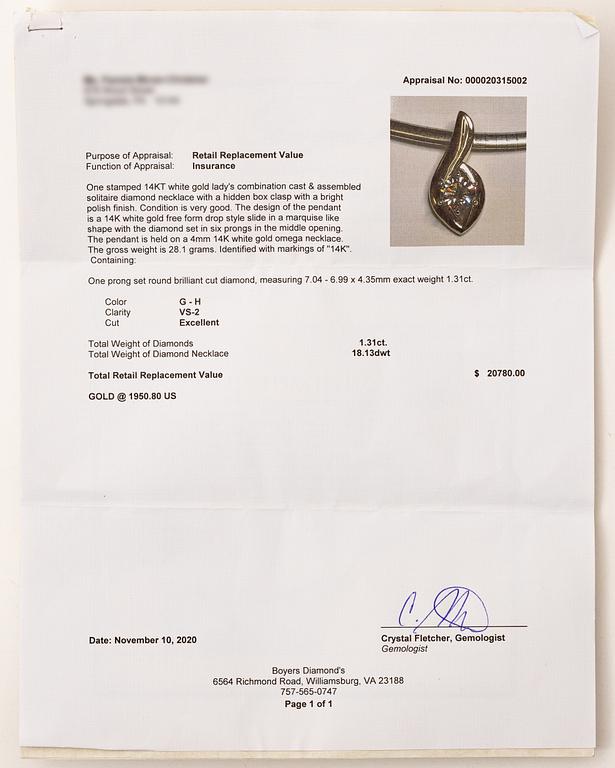 14K white gold solitaire diamond pendant.