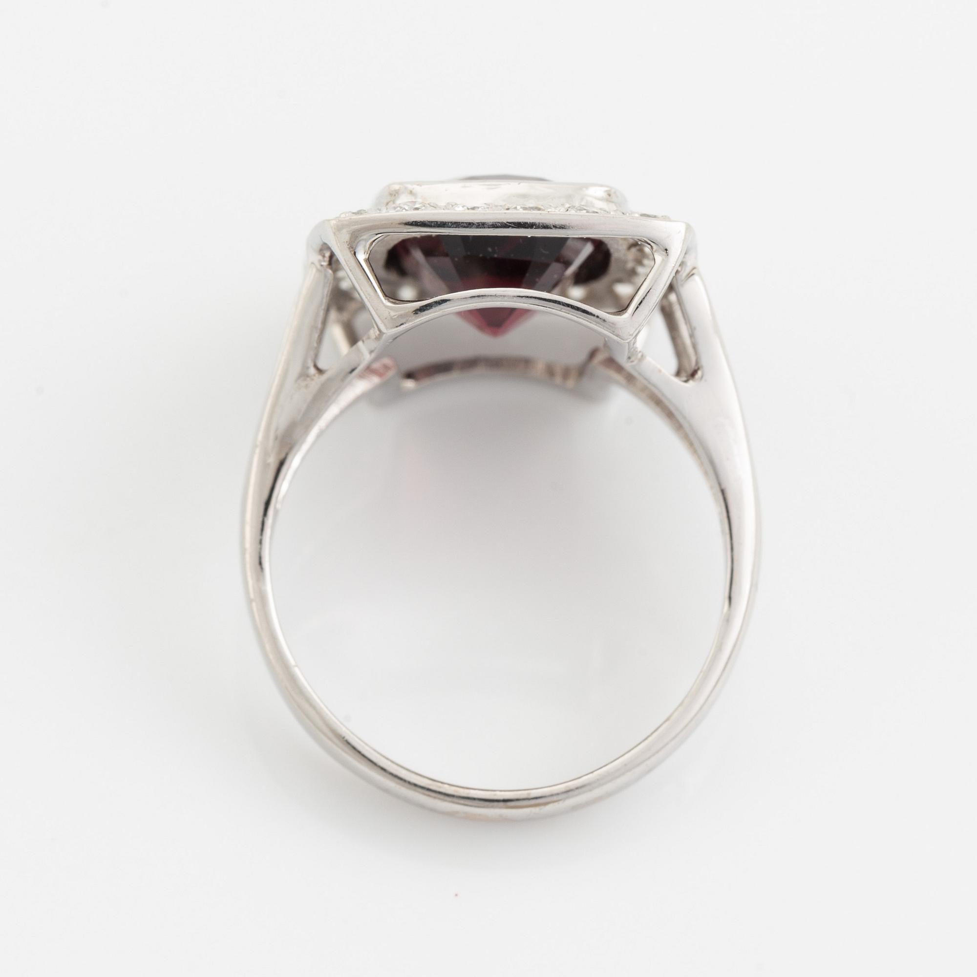 Red spinel and brilliant cut diamond cocktail ring.