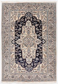 A Nain carpet, ca 300 x 200 cm.