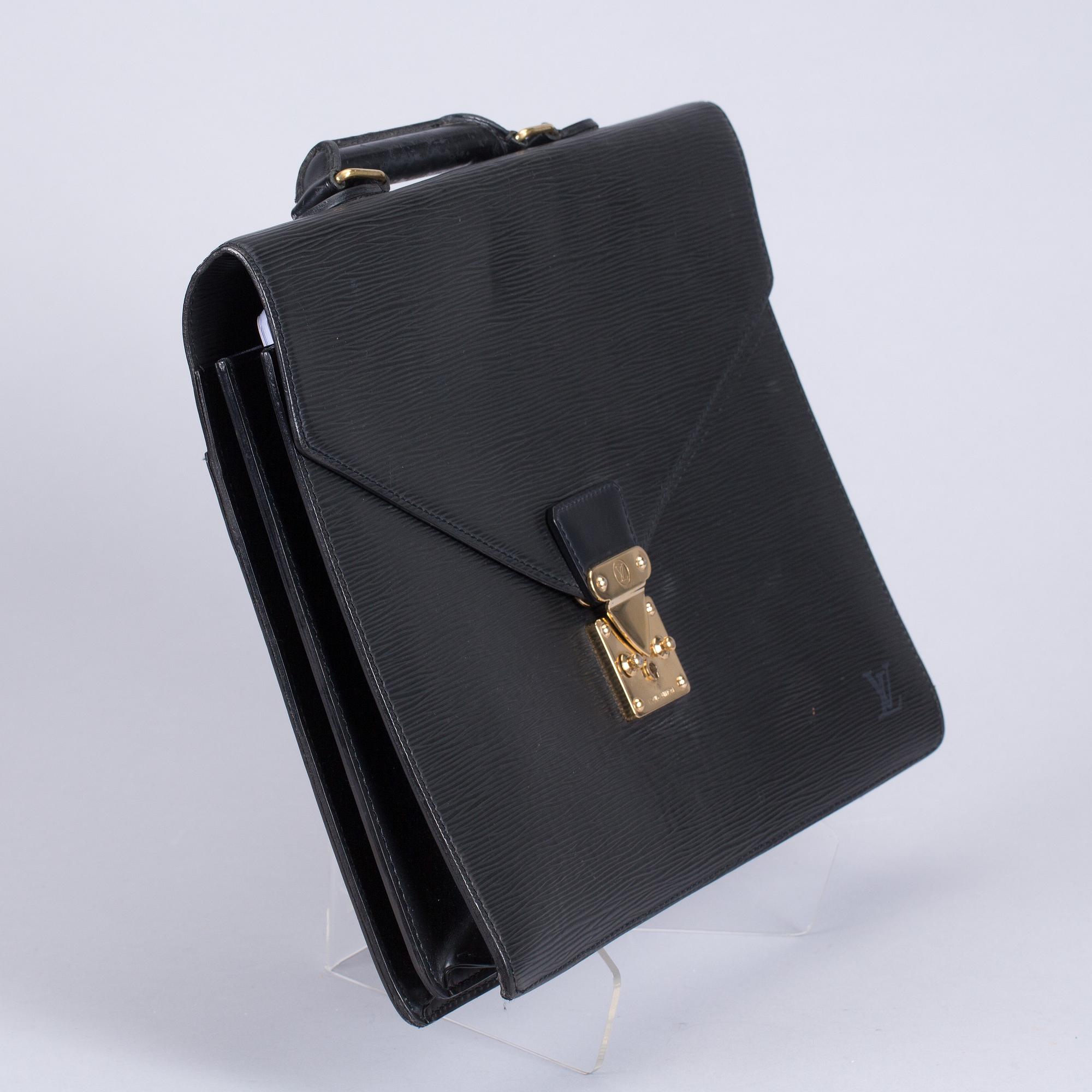 PORTFÖLJ, "Serviette conseiller ambassadeure Epi", Louis Vuitton.