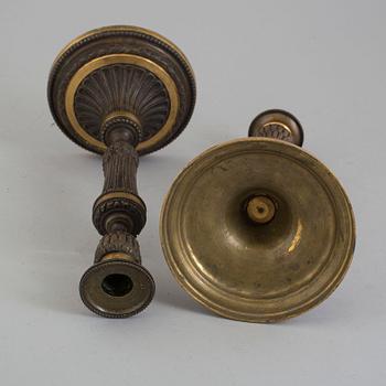 A pair of late 18th century Louis XVI bronze candlesticks, France.