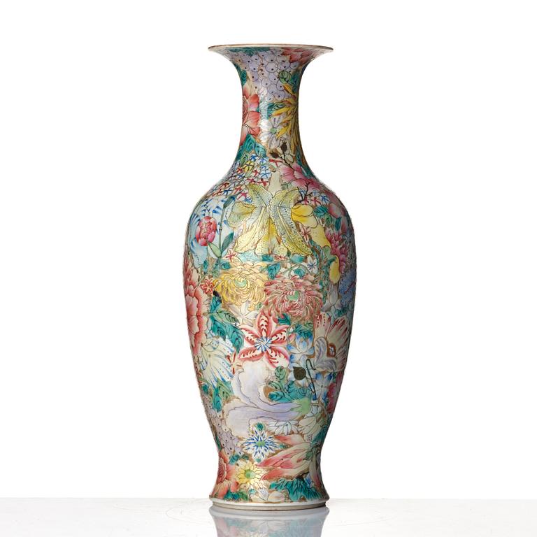 A famille rose 'mille fiori' vase, late Qing dynasty, with Qianlong mark.