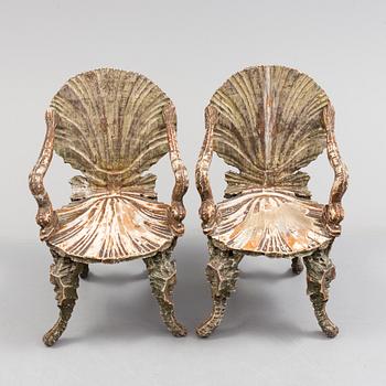 A pair of 20th century grotto armchairs.