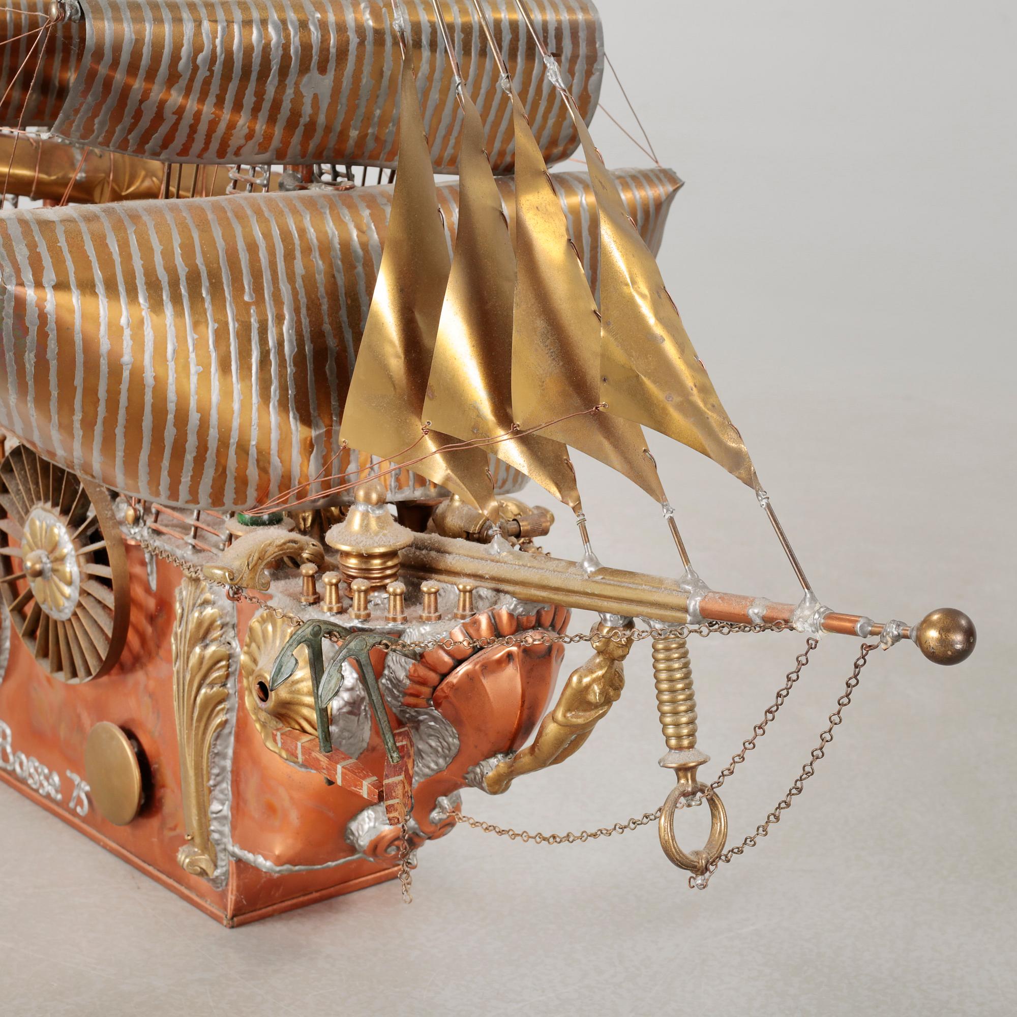 A boat sculpture, dated -75.