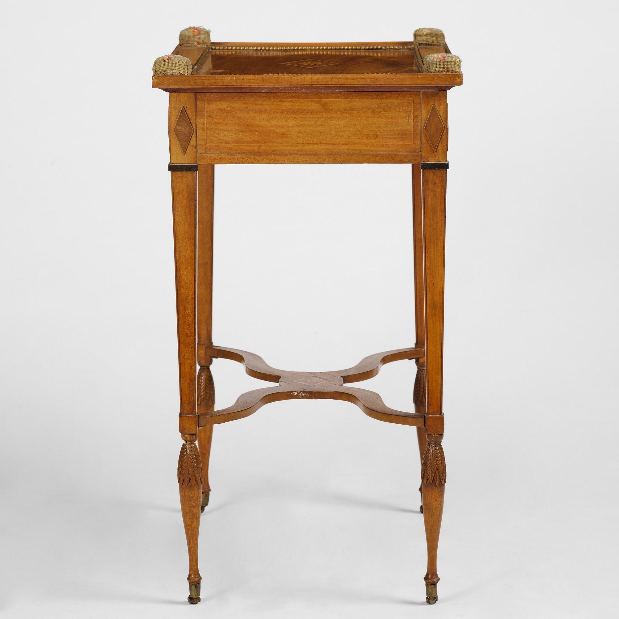 A late Gustavian mahogany table attributed to L. Qvarnberg (master in Stockholm 1801-13).