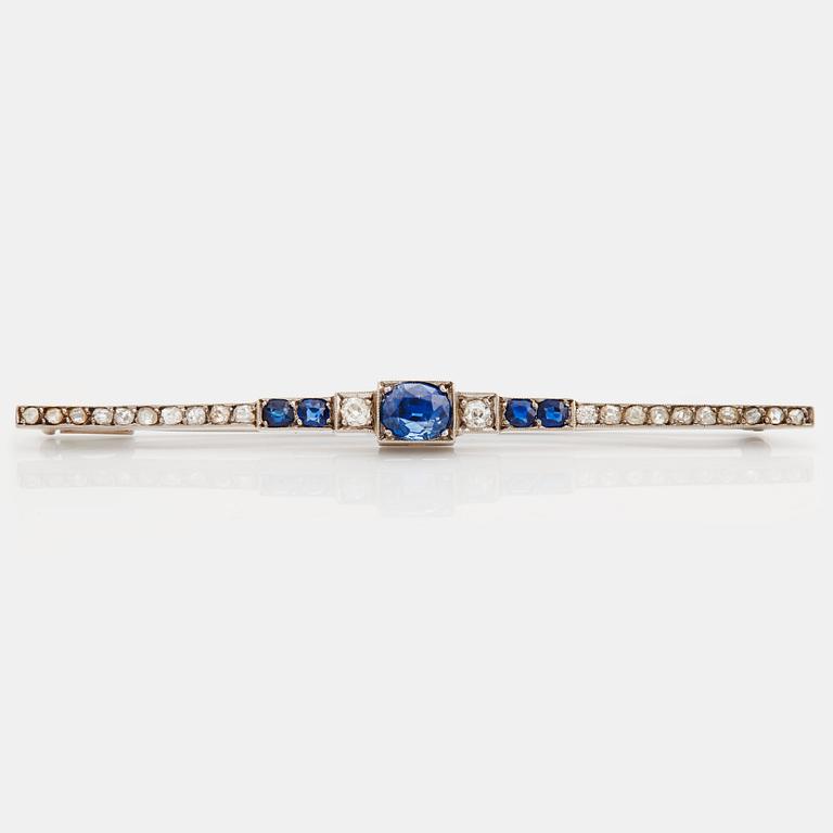 A brooch set with sapphires, old- and rose cut diamonds.