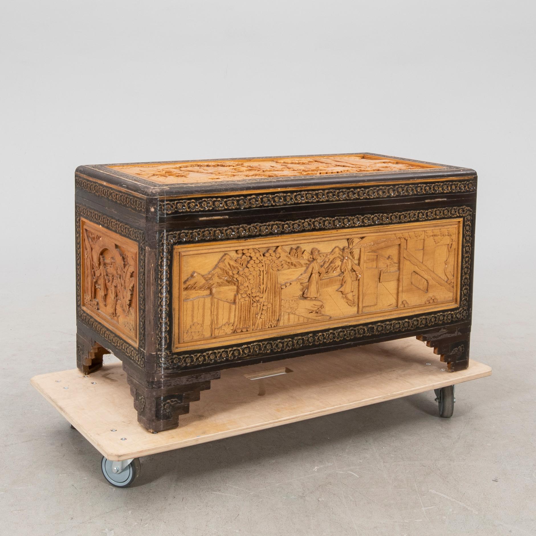 An Asian wooden coffin 20th century.