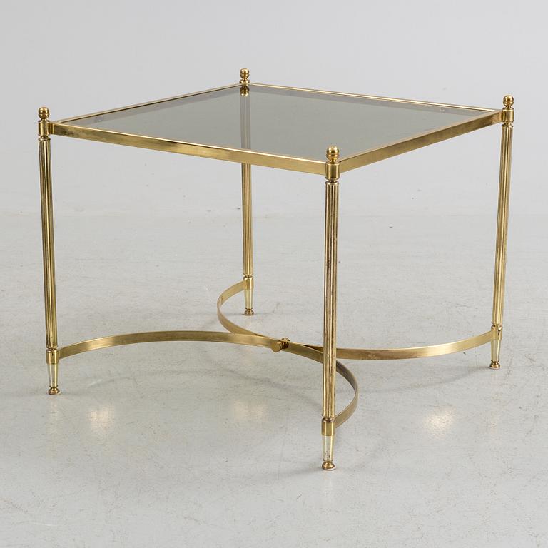 A brass and glass coffee table from the second half of the 20th century.