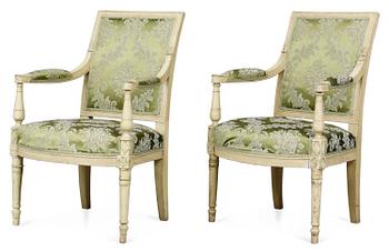 864. A pair of Directoire armchairs.