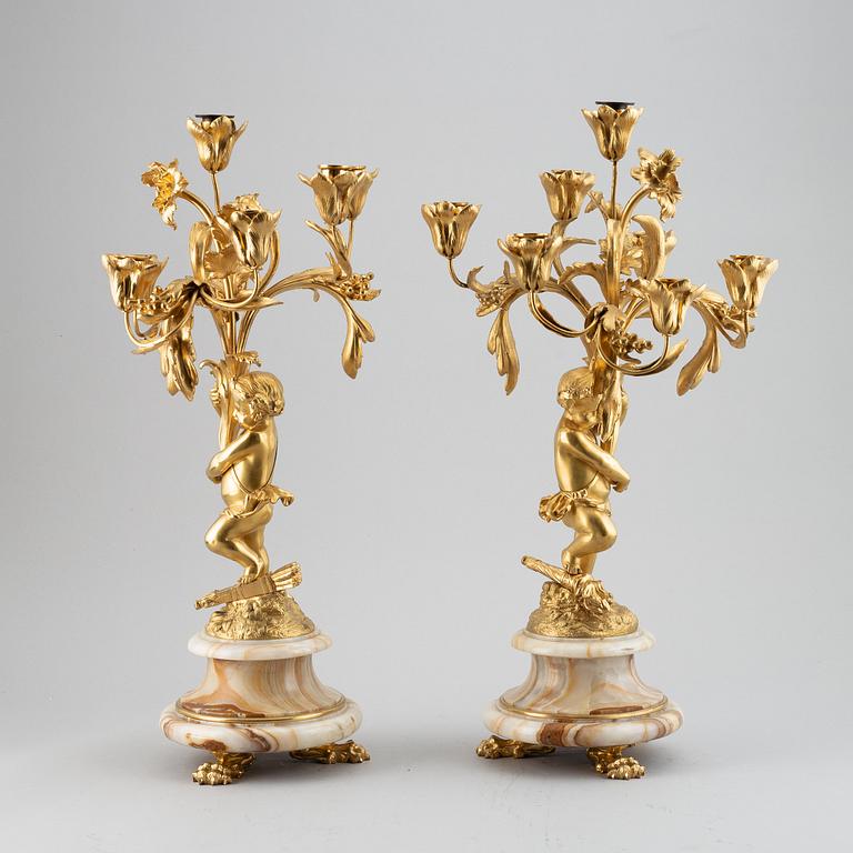 A pair of mid 19th century ormolu and onyx candelabra.