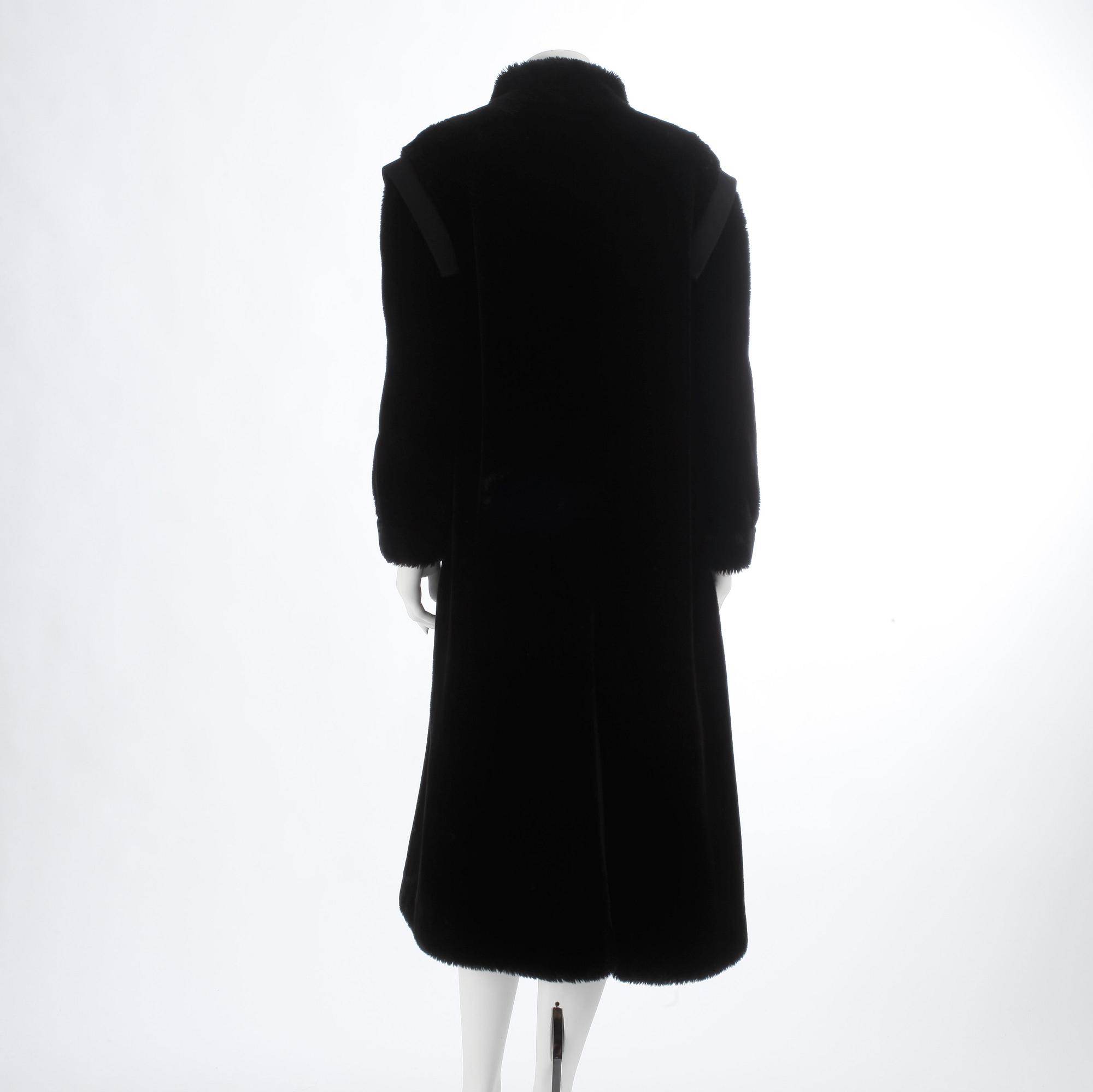 SONIA RYKIEL, a faux fur black coat.