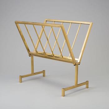 a brass magazine shelf.